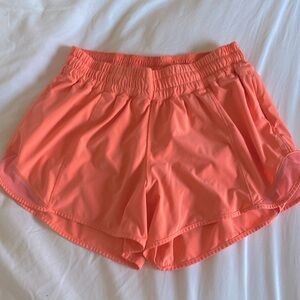 Lululemon size 8 tall peachy pink/orange shorts